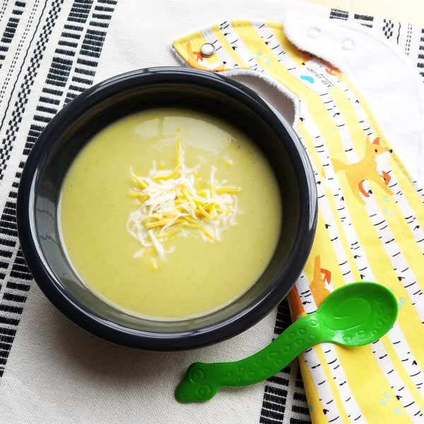 kid-approved broccoli soup with shredded cheese