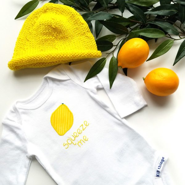 lemon bodysuit + hand knit hat