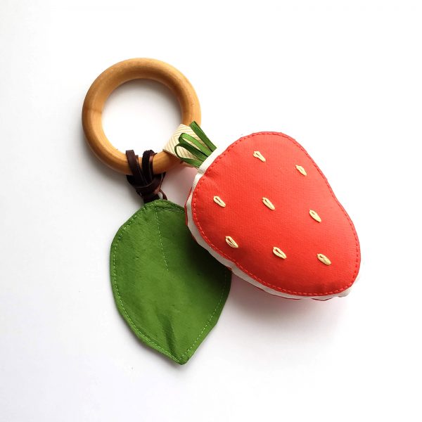 red strawberry teething toy