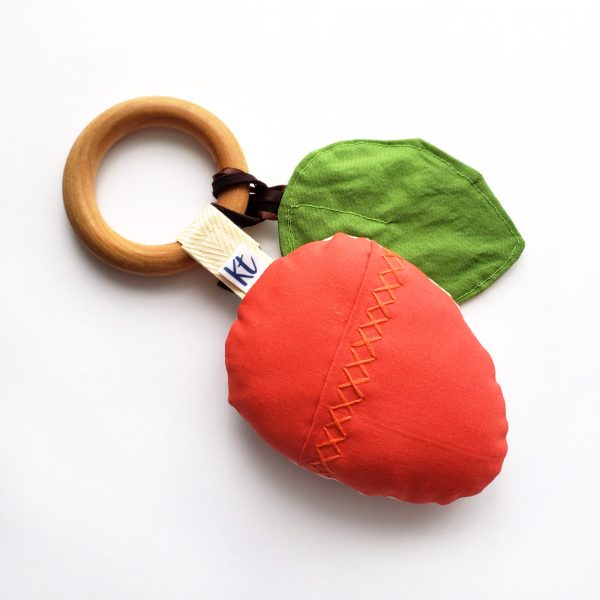 red strawberry teething toy - back